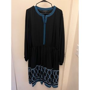 Navy blue long sleeve dress with design at bottom!